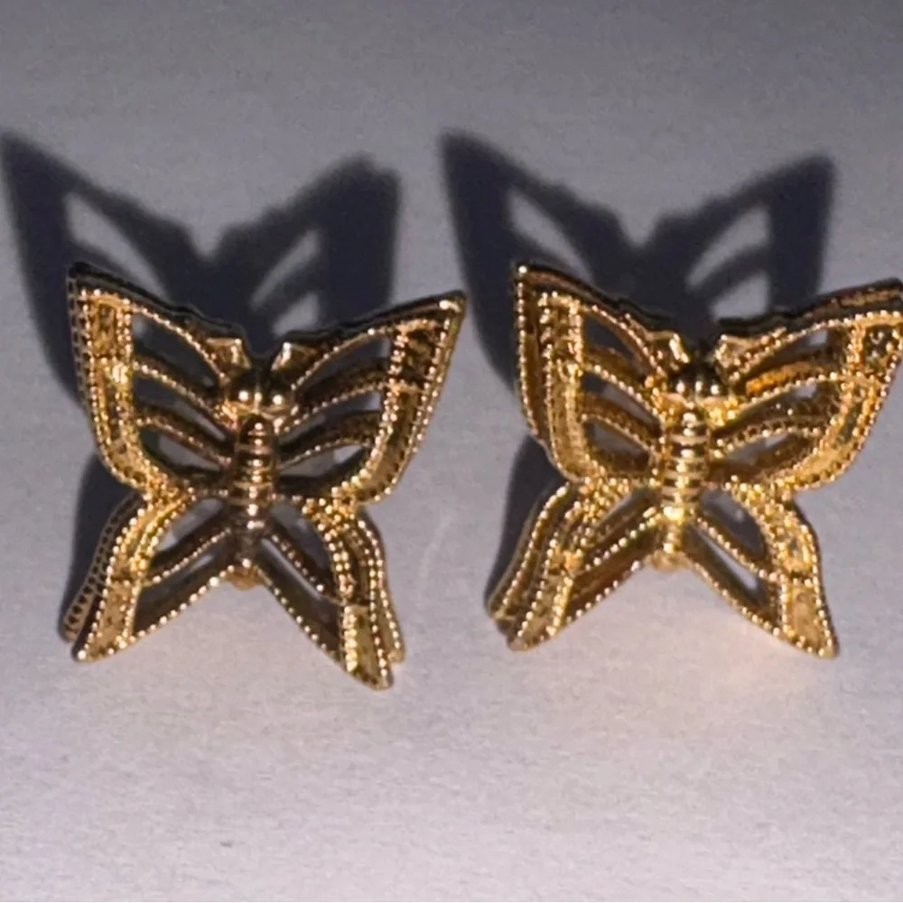 Gold tone intricate Butterfly design Earrings NWOT